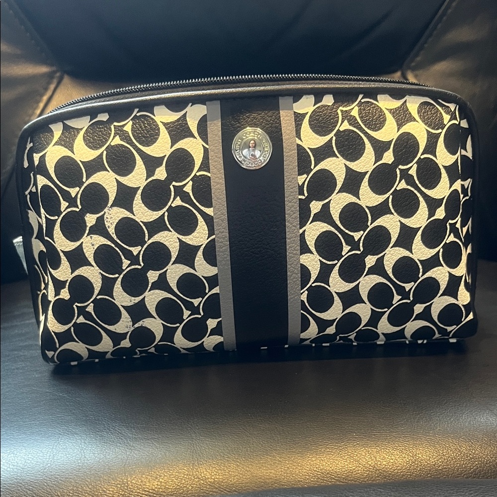 COACH BLACK AND CREAM COSMETIC BAG